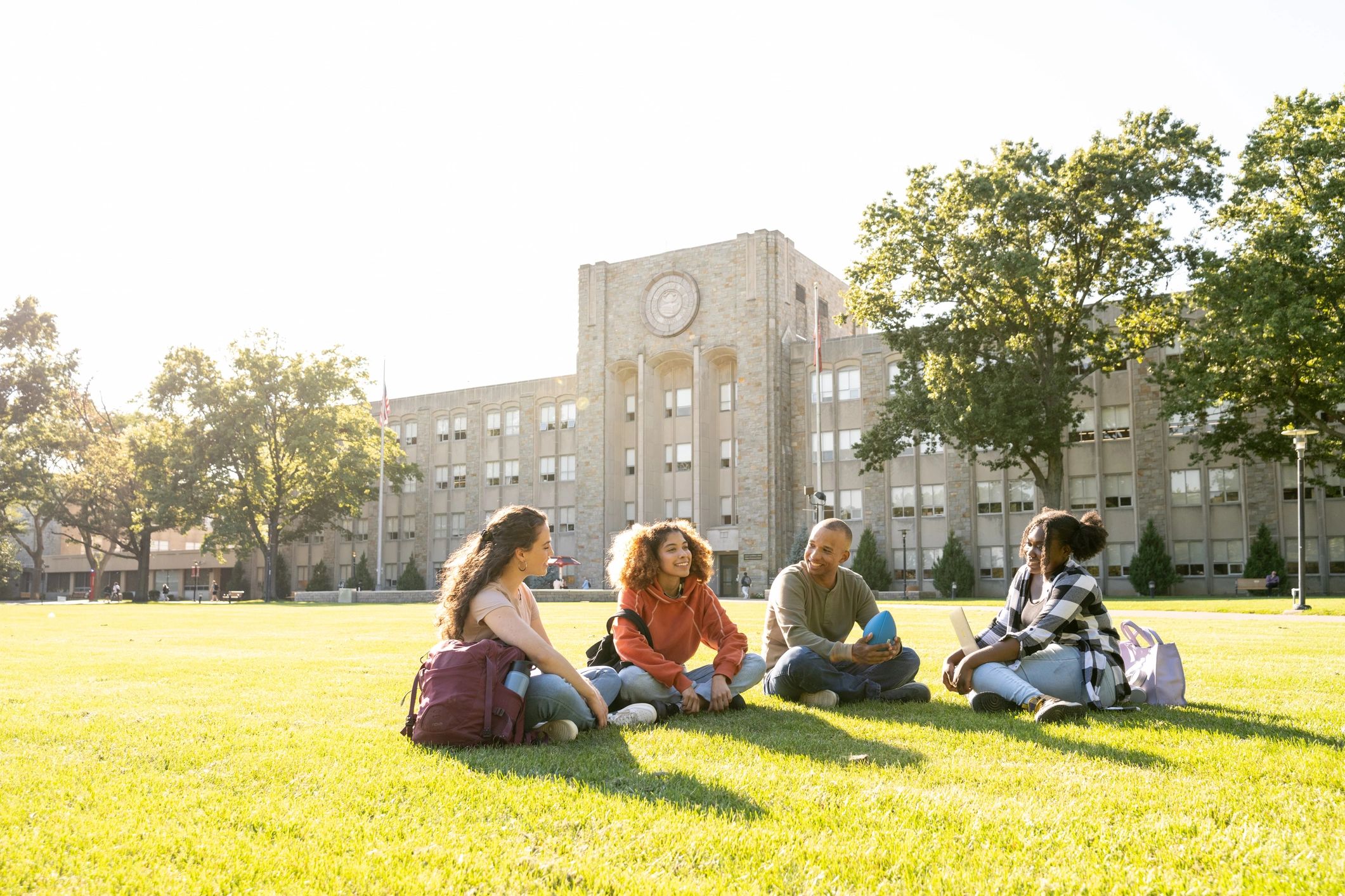 Students gathered outdoors on a university campus