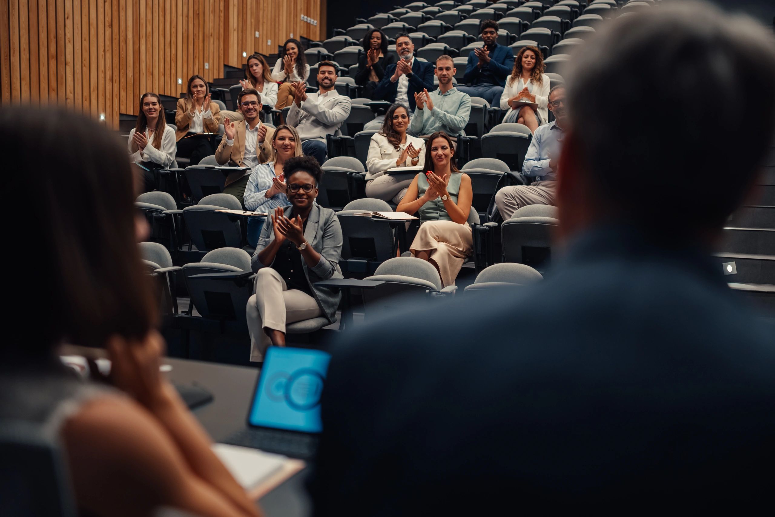 Audience attending a conservation conference presentation